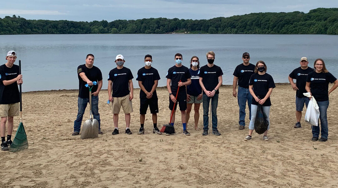 The Winn Machine Team Pitches In To Clean Up Stone Lake Beach 