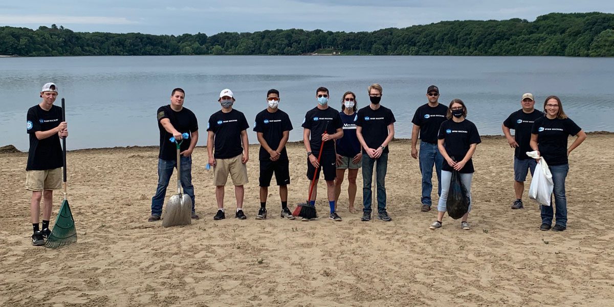 The Winndeavor Team Pitches In To Clean Up Stone Lake Beach 